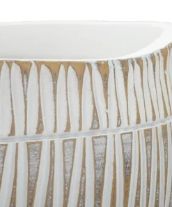 Cache-pot en polyrésine décoré de motifs géométriques et linéaires blanc et doré