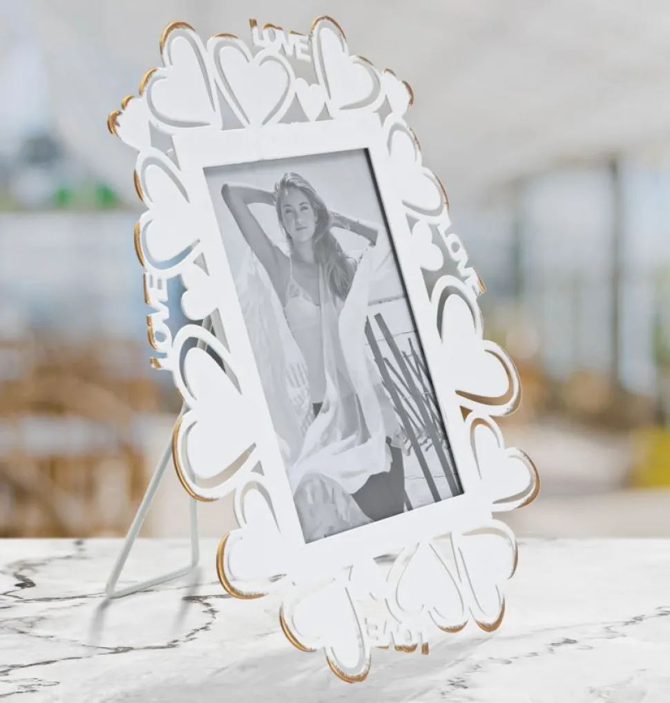 Cadre photo en métal blanc avec motifs cœur en verre doré