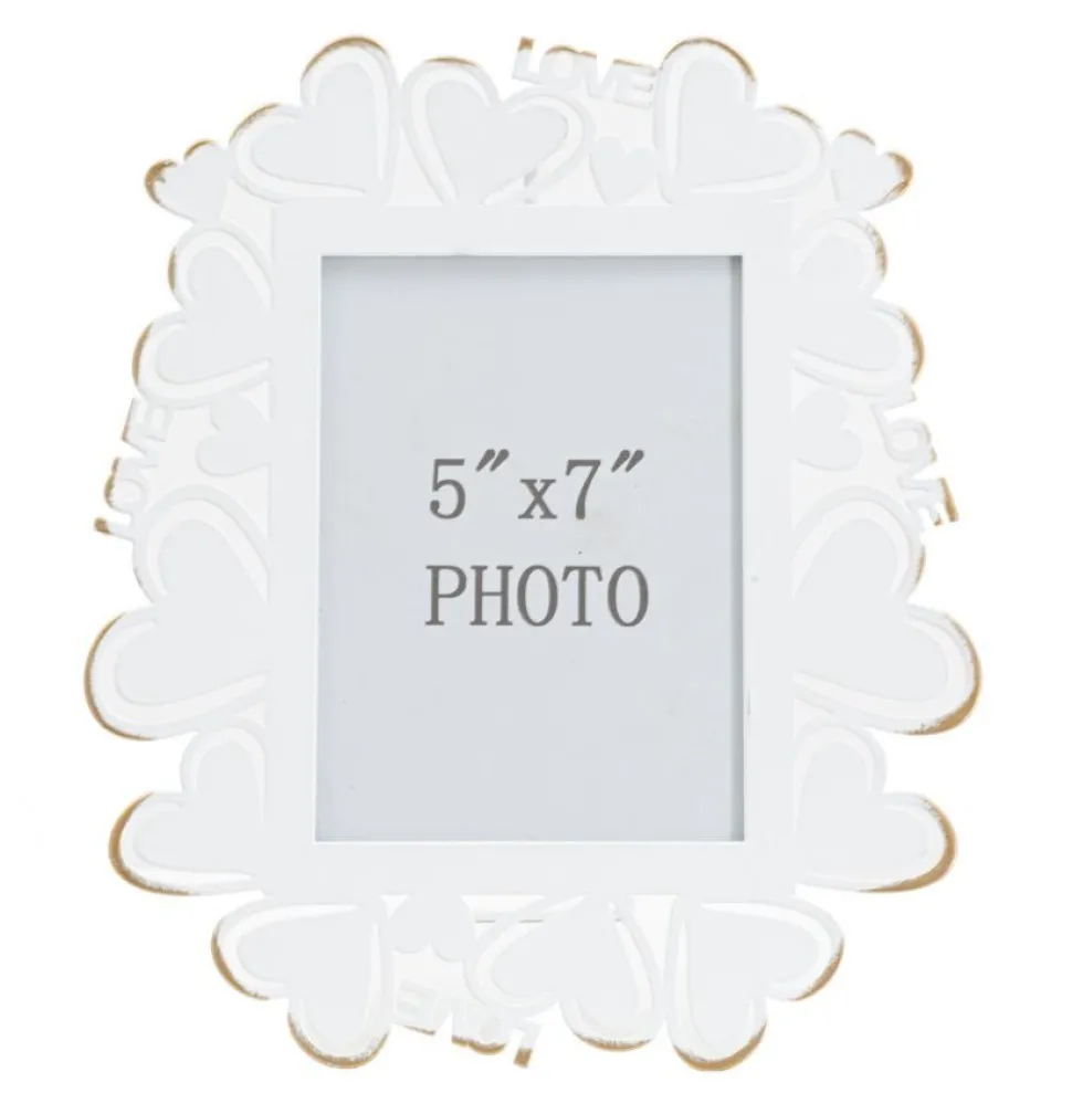 Cadre photo en métal blanc avec motifs cœur en verre doré