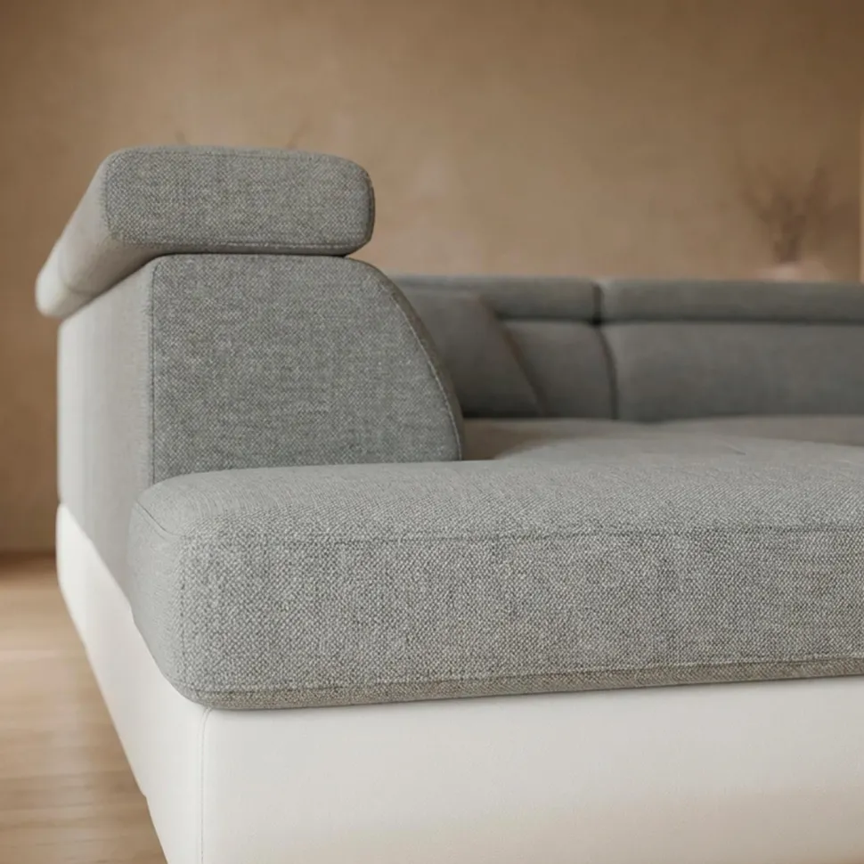 Canapé d'angle convertible Antoni avec têtières relevables angle gauche simili Blanc et tissus Gris clair