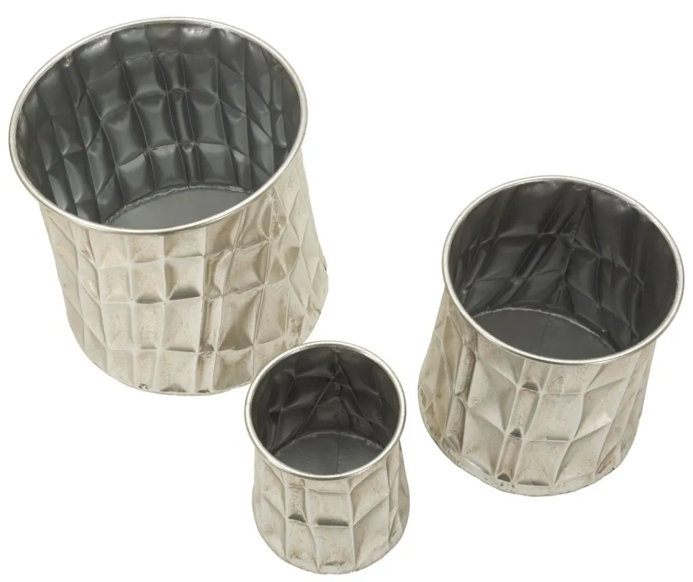 Ensemble de 3 vases Argentés reliefés
