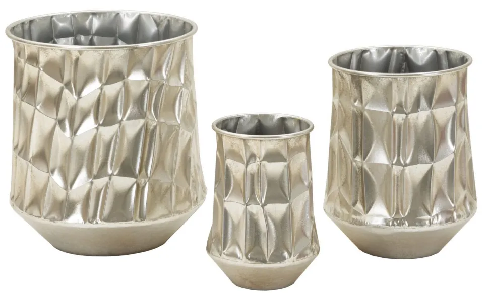 Ensemble de 3 vases Argentés reliefés