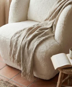 Fauteuil cosy Furdol Tissu Effet peau de mouton Crème