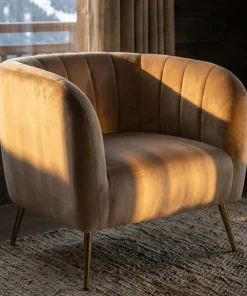 Fauteuil moderne Bombaro pieds métal doré et Velours Taupe