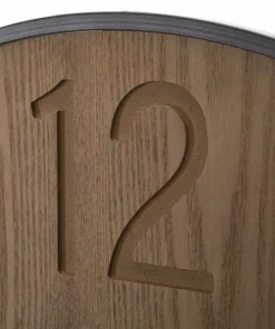 Horloge murale ronde métal et MDF noir et marron décor feuilles