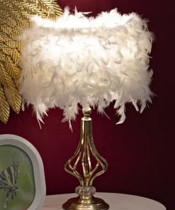 Lampe de table Tarty métal doré abat-jour plumes synthétiques blanches