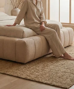 Lit-coffre avec rebords matelassés Challow 140x190cm Tissu Bouclette Beige