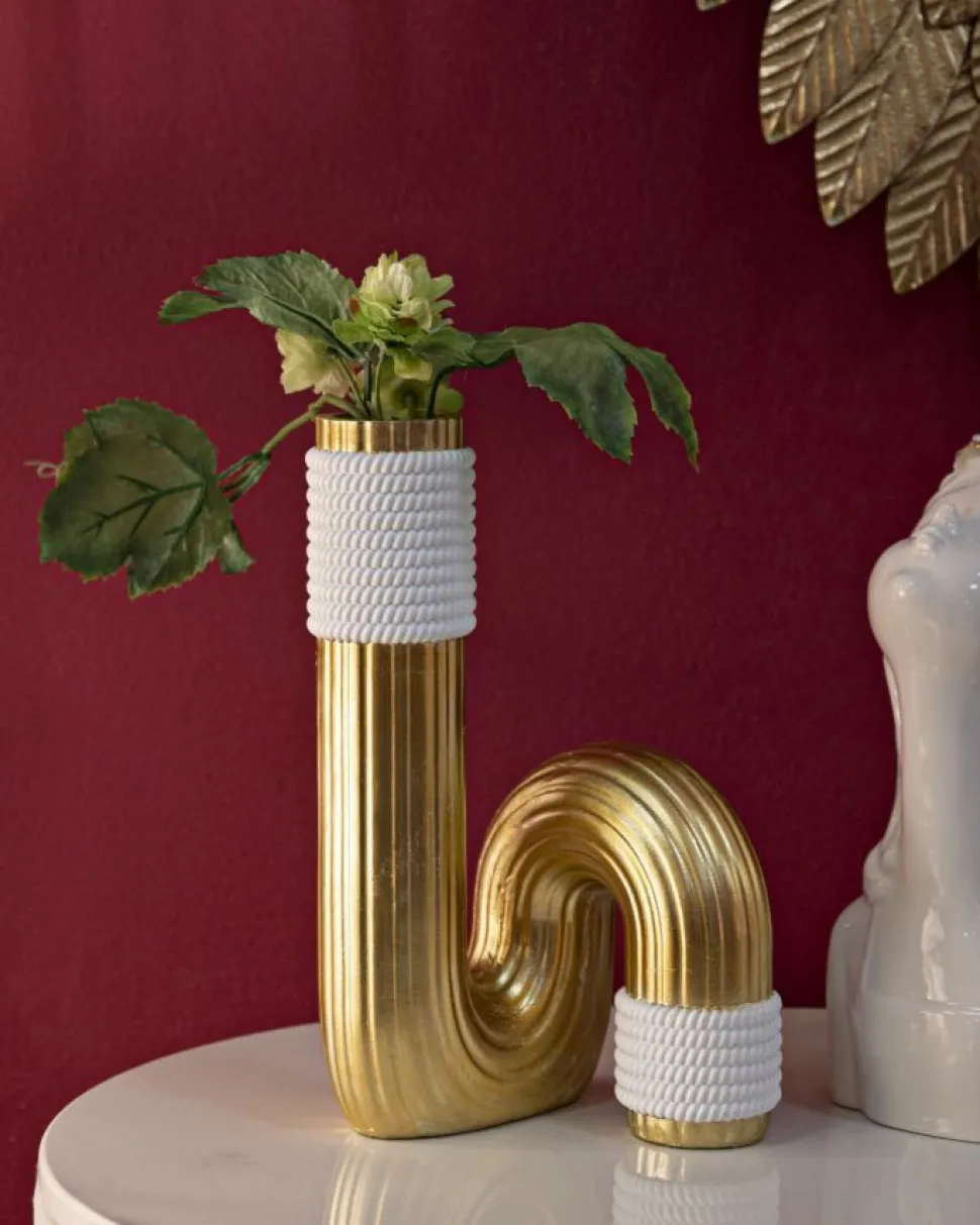 Vase en polyrésine dorée et blanche