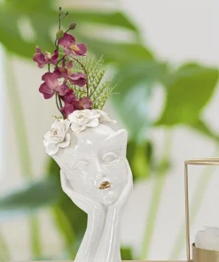 Vase féminin en porcelaine décoré d'une couronne de fleurs blanc et or